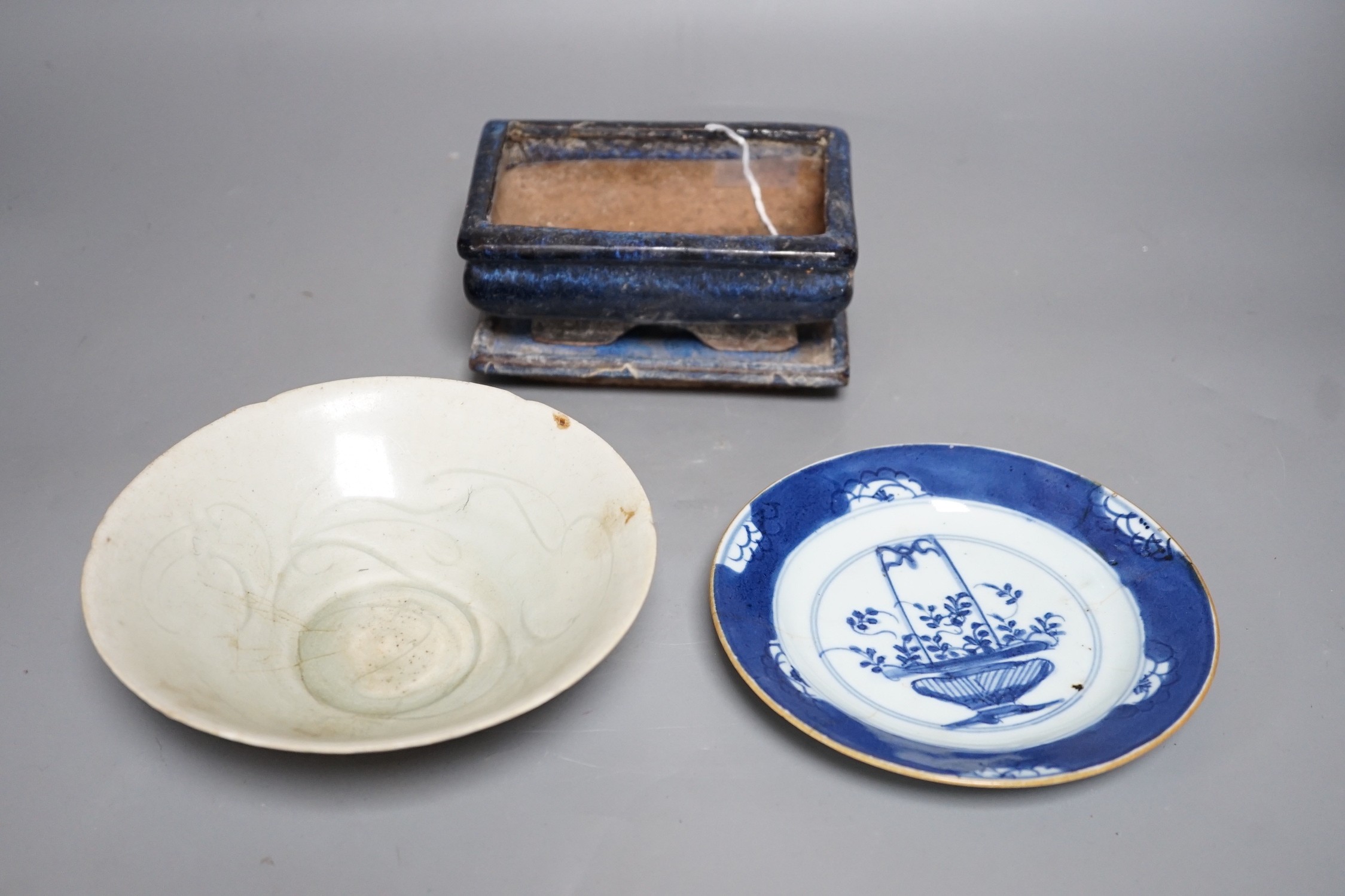 A Chinese blue and white plate a pottery planter and stand and a Qingbai type bowl, bowl 16.5cms diameter